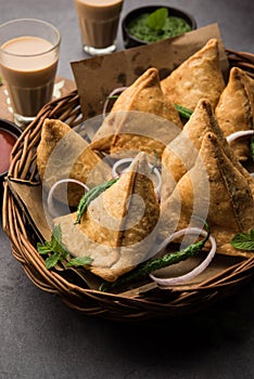 SamosaÂ Snack is an Indian deep fried pastry with a spiced filling usually made with potatoes, spices and herb